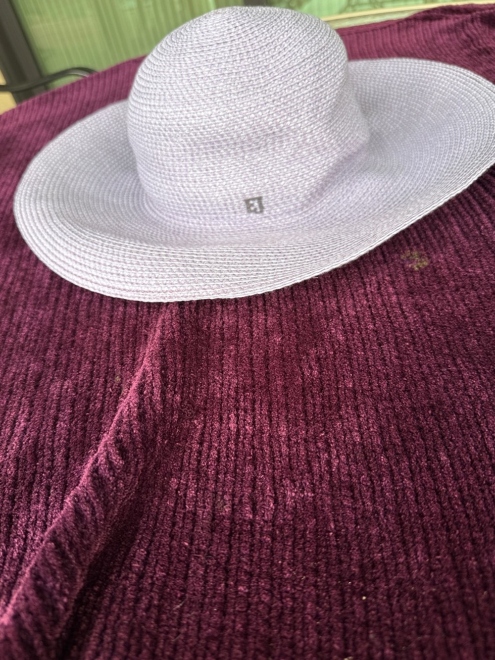 Light Lavender Wide-Brim Straw Sun Hat. Brim is 4.5. It was worn once and has a